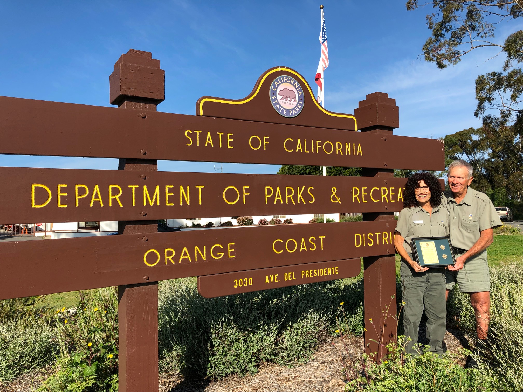 Orange Coast- Dick & Shirley Sacco with Medallion